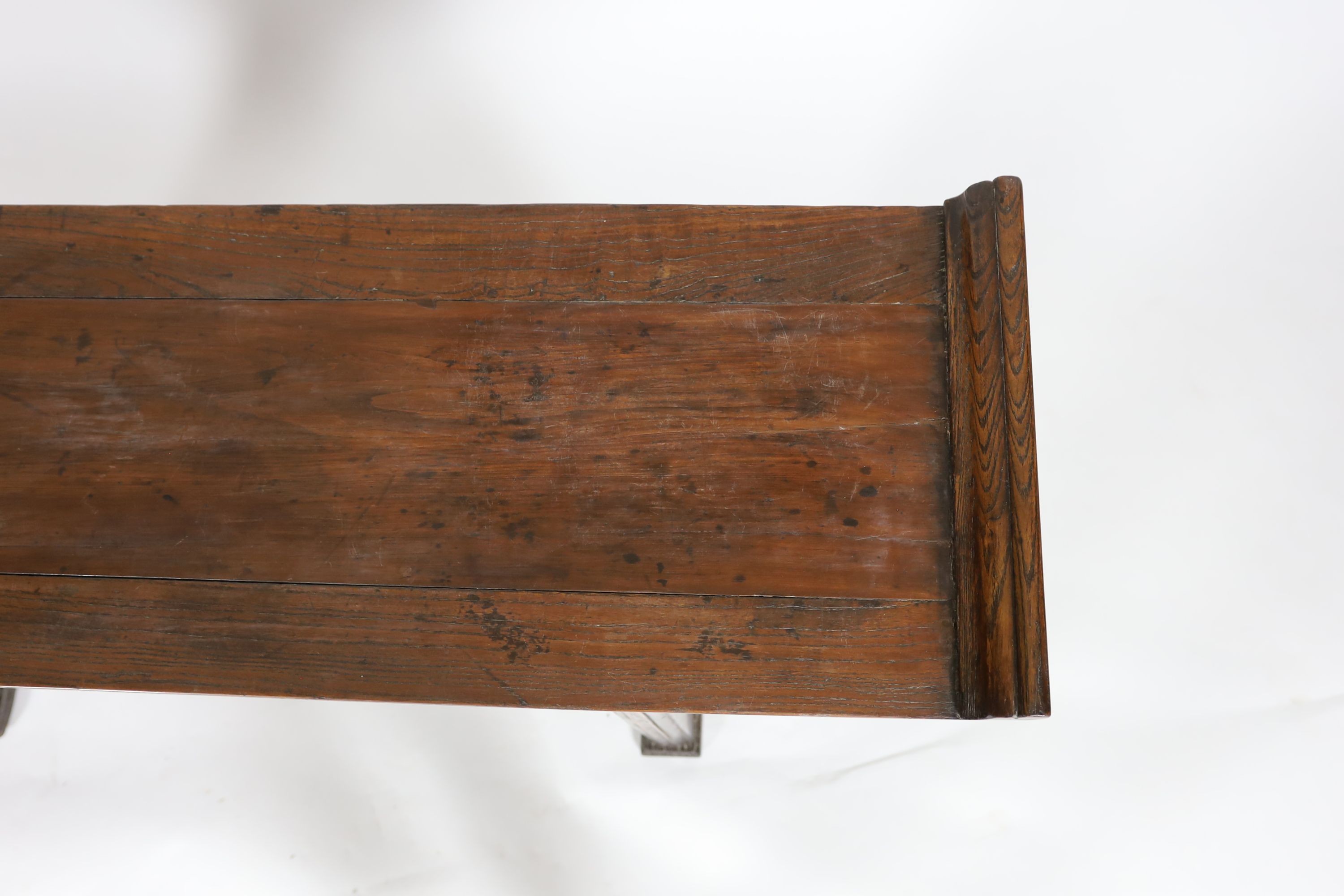 A Chinese elm and cypress wood altar table, 17th/18th Century, 168 cm long, 43 cm deep, 93 cm high, length reduced